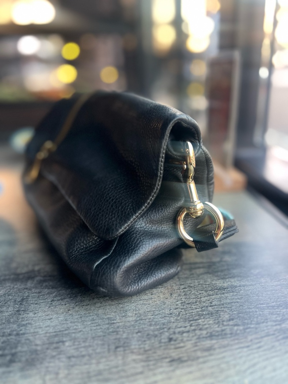 Hobo leather black shoulder bag gold zipper accents